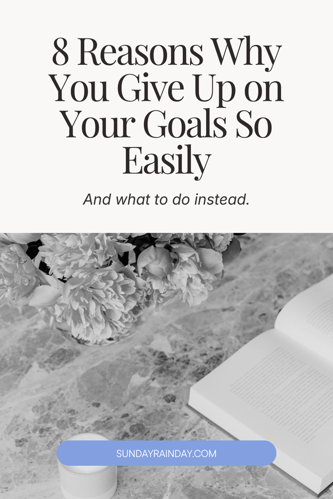 8 reasons why you give up on your goals so easily and what to do instead, with peonies and an open book on a marble table