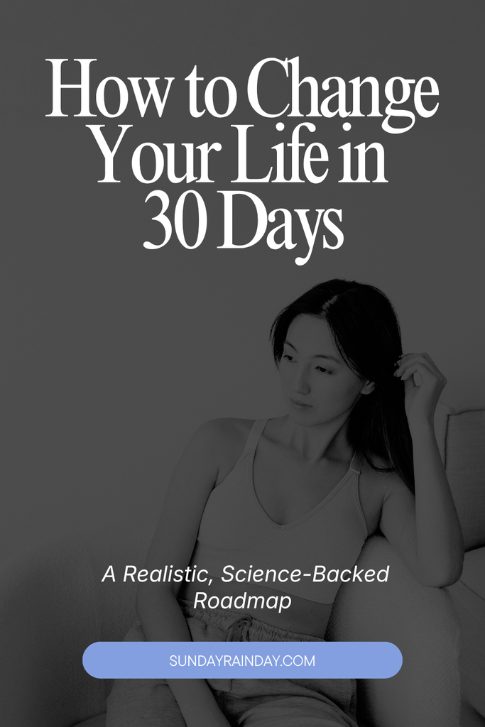 Pinterest pin of a woman sitting on a couch, titled "How to Change Your Life in 30 Days: A Realistic, Science-Backed Roadmap"