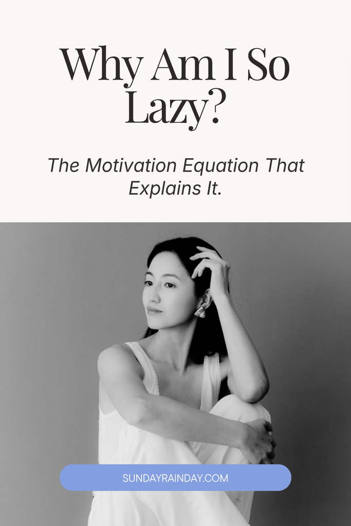 Black-and-white photo of a thoughtful woman sitting with her knees drawn up and her hand in her hair, under the title “Why Am I So Lazy? The Motivation Equation That Explains It”.